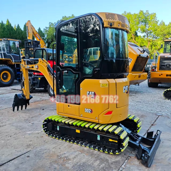 CAT® 302 CR Mini 2 ton Excavator With Blade/Extendable Chassis | Shanghai KASTO for Family/ Farming Featured Image